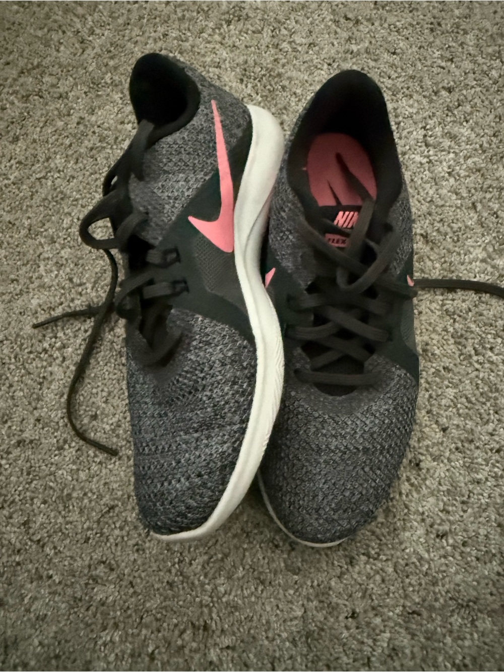 Nike Women’s Grey Knit Running Shoes with Pink Swoosh Accent